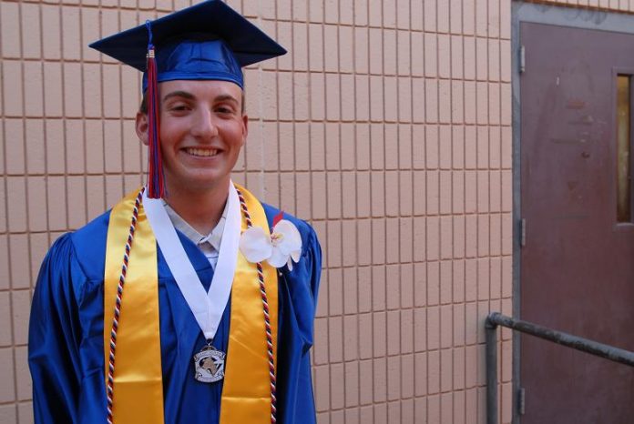 Senior Mike Boler poses for a shot during graduation. Boler made the honor roll this year with a 3.2 GPA and is looking to continue his education in the fall.