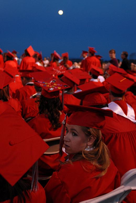 Last look back: Jordan Magana glances behind her while waiting to receive her high school diploma with the rest of the 2010 Mingus Union High School 2010 graduating class May 26.