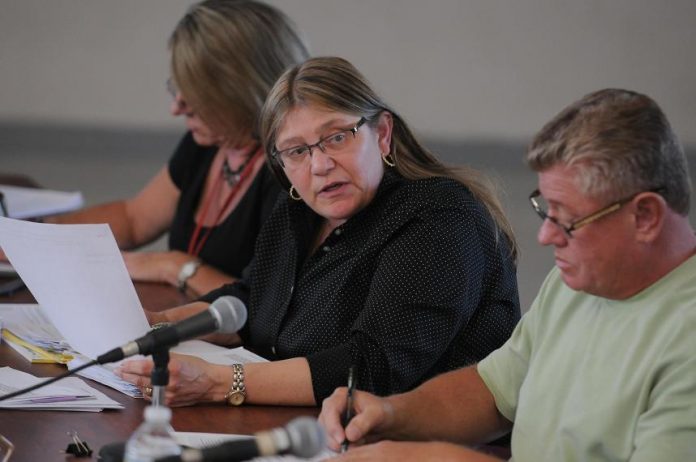 Patrice Horstman, legal counsel for the Mingus Union High School District governing boar, explains the options available to the board members at the school board meeting Monday, June 14, regarding the decision of whether or not to accept the district administration's recommendation in the matter of physical education teacher and state champion winning wrestling coach Tom Wokasch, who is alleged to have mismanaged funds.