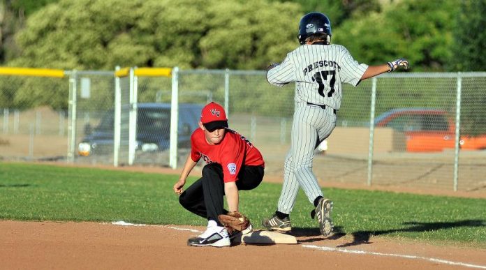 First baseman Josh Scalf reaches for a throw to get an out in a game July 6. Scalf recorded a base hit in the top of the fifth inning Thursday, July 22, in a 5-2 loss to the Lake Havasu All-Stars.