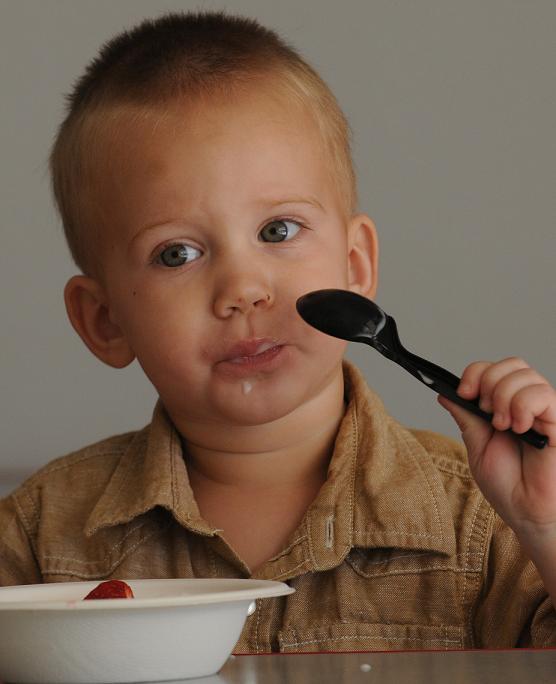 Stone Durkaleck, Buena Vista Bright Futures child-care recipient, enjoys a snack of fruit and yogurt Aug. 11. Executive Director Erin Mabery Lamb said without immediate financial help, services provided to the community by Buena Vista could be negatively affected.