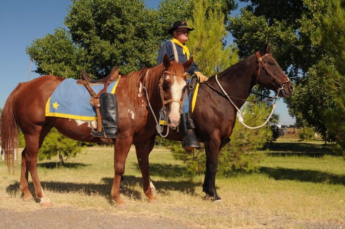 Howard Parrish and the rest of the Camp Verde Cavalry will lead a riderless horse through the Fort Verde Days Parade on Saturday, Oct. 9, to honor lifetime cavalry member C.A. McDonald, who died in November 2009.