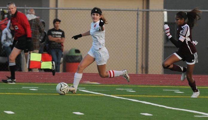 Junior Torey Braly points to her teammate looking to get her the ball in a match Jan. 4. Braly scored a hat trick Saturday, Jan. 15, in a 7-0 win over Grand Canyon region rival Mohave Valley High School. Braly’s three goals gave her the scoring title for goals in a single season by one player with 30.