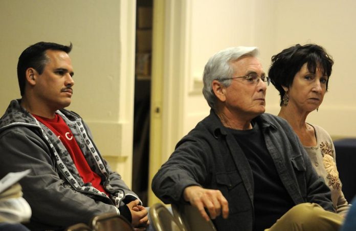 Cottonwood-Oak Creek School District board member Jason Finger, left, and COCSD Superintendent Barbara U'Ren, right, attend an informational meeting with Yavapai County School Superintendent Tim Carter, not pictured, on Monday, Feb. 7, which was requested by a group of concerned COCSD tax payers unhappy with the direction the school board is taking.