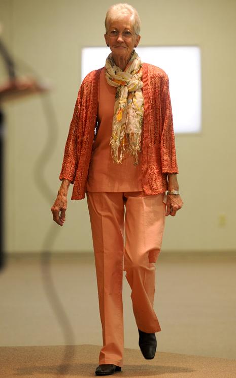 Michele Bradley/Larson Newspapers Paula Olguin struts onto the stage at the Immaculate Conception Parish Hall at the Ladies of the Valley Auxiliary fashion show fundraiser Saturday, March 5.