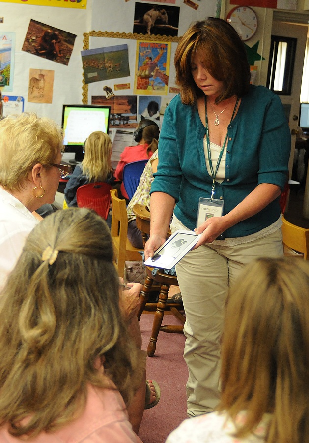 Ruth Lacey, a representative from a major book retailer, right, explains the differences in different types of e-readers during a class at the Camp Verde Town Library on Thursday, May 19. The library staff is currently working out the details on how to manage library loans of e-readers and downloadable books and plans to have them available to the public soon.