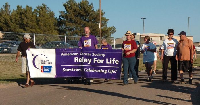 Camp Verde residents walk around the track at Camp Verde High School in this 2008 photo. Camp Verde Relay For Life is hosting a Relay Rally this Saturday at the Outpost Mall.