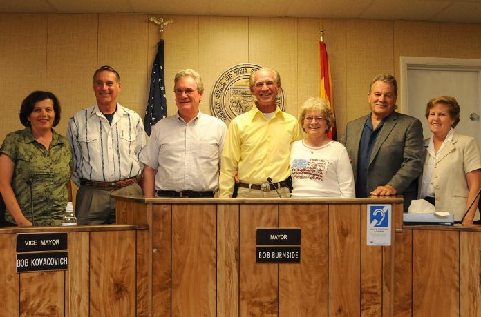 The Camp Verde Town Council after being sworn in by Judge Harry Cipriano at the meeting Wednesday, June 1. The 13th Camp Verde Town Council includes, from left, Robin Whatley, Bruce George, Bob Kovacovich, Bob Burnside, Jackie Baker, Alan Buchanan and Carol German.