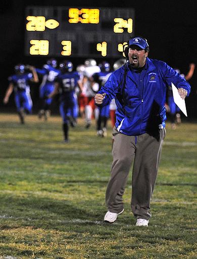 Luke Steege, the head coach of Camp Verde High School football, cheers for his team as they take the lead over the Mingus Union Marauders in October 2011. The win was the first time CVHS beat MUHS in its school history. Steege resigned as head coach this month after 14 years with the team and has accepted a football head coach position in his home state of Iowa.