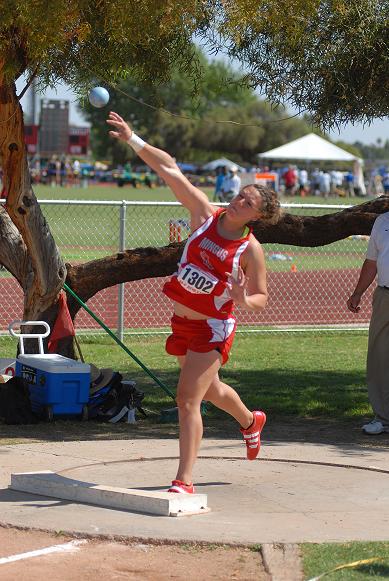 Heather Calandra, a junior at Mingus Union High School, launches the shot put during a regular season meet earlier this year. Calandra is now back-to-back state champion in the shot put and discus after throwing 41 feet [shot put] and 119 feet [discus] at the 2013 Boys and Girls Track and Field Division III State Championships on Saturday, May 11, at Mesa Community College.