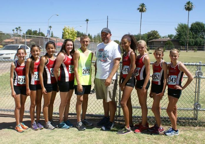 The Aftershock distance club brought home five gold medals and all 10 athletes placed in the top 10 in one or more of their events at the USA Track and Field State Championships at Mesa Community College. From left, Swayze Smith, Allyson Arellano, Karen Arellano, Penny Fenn, Chris D’Angelo, Coach Micah Swenson, Brianna Epperson, Jalen Ebert, Rachel Valentine and Sydney Alexander.