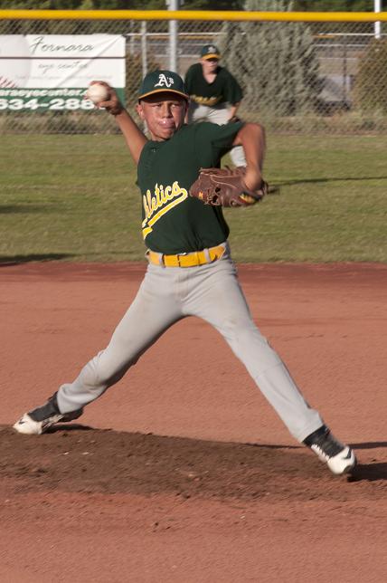 Alex Nielson, the pitcher for the Verde Valley Little League Majors baseball team, the A’s, winds up a pitch during the Tournament of Champions on Friday, June 7, at Jimmy Herridge Memorial Field at Riverfront Park in Cottonwood. The A’s were knocked out in the semifinals of the tournament, losing to Prescott Valley 3-1.