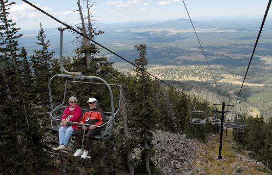 Summer visitors to the Arizona Snowbowl take the Scenic Chairlift Ride to enjoy the panoramic views from Sedona’s red rocks to the Grand Canyon and the above-ground ammunition bunkers at Camp Navajo. The lift, which is open Fridays, Saturdays, Sundays and holiday Mondays, carries families, vacationers and sweethearts to Arizona’s only arctic alpine tundra 11,500 feet above the ancient bristlecone pines, gaining more than 2,000 feet in elevation.