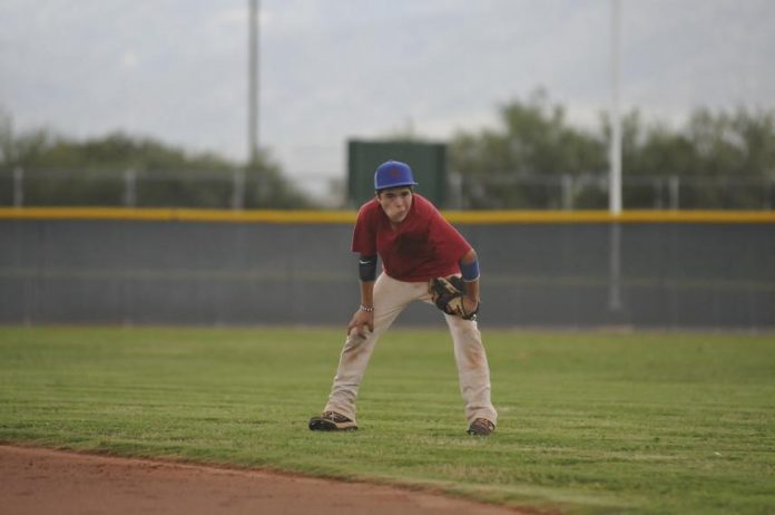 Antonio Almendarez, of the Camp Verde Juniors All-Stars, readies himself to make a play during a practice session with his team, July 16, before they headed to Sierra Vista for the state tournament.