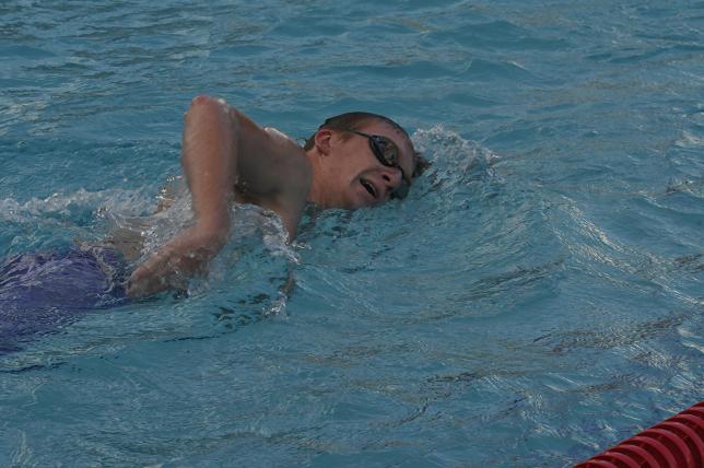 Senior team captain Dylan Wilber glides through the water at the Mingus Union team practice Tuesday, Aug. 20 at the city's outdoor pool.