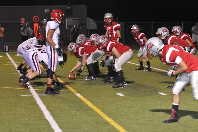 Quarterback Micah Nevarez lines the Mingus offense up in their game against Paradise Valley on Friday, Sept. 13 in Cottonwood.