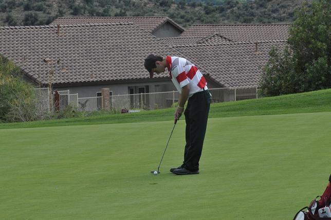 Gary Baker of the Mingus golf team lines up a putt at the team's invitational on Thursday, Aug. 29.