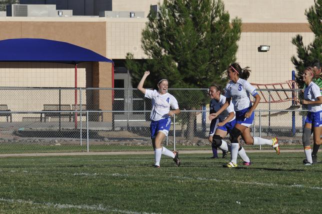 Tallianna Wallner celebrates with teammates after scoring a goal early in Camp Verde's 5-0 win over Payson.