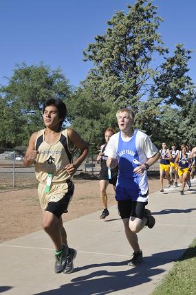 Joey Benson, right, sprints out from the start at the Camp Verde Invitational on Saturday, Sept. 28, in Camp Verde.