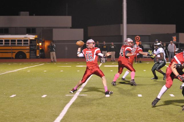 Tanner Caron goes back to pass in the Marauders' game against the Flagstaff Eagles on Friday, Oct. 4, in Cottonwood. Tanner Caron goes back to pass in the Marauders' game against the Flagstaff Eagles on Friday, Oct. 4, in Cottonwood.