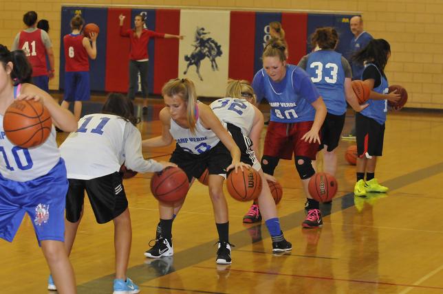 The Camp Verde girls basketball team practices on their dribbling at the team practice Friday, Nov. 15 at the CVHS gymnasium.