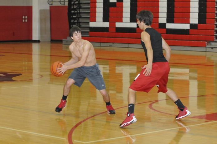 Micah Nevarez [right] guards Tristan Clark during a Marauders practice earlier this season.