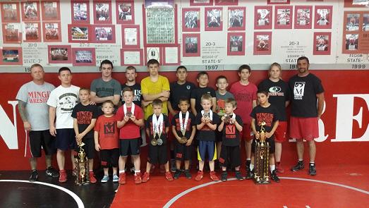The Mingus Mountain Muckers, which placed fifth at their state club wrestling meet Saturday, March 29, in Casa Grande, display their trophies and medals from their 10th-place finish at the Terminator World Championships, held March 15 in Prescott Valley. Top row, from left, are assistant coach Nate Dixon, head coach Klint McKean, Brett Lovoi, Tyler Conway, Carter Scott, Antoine Zabala, Jacob Pfeifer, Trent Miller, Danni Schulz and assistant coach Kory Miller; bottom row, from left, are Elijah Miller, Stephan Dixon, Isaac McKean, Nathan Dixon, Koby Delahel, Elias McKean, Aaron Moore and Kai Miller.