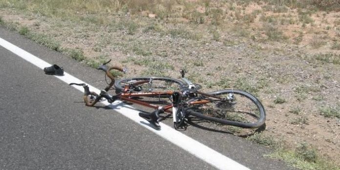 The crushed bicycle of a 48-year-old Gilbert woman lies along the side of Cornville Road after being struck by a 2011 Chrysler van driven by a 90-year-old man from Cottonwood on Saturday, May 17. The woman was airlifted to Flagstaff Medical Center where she died around 6 p.m. The cyclist was participating in the first day of the BikeMS charity ride when she was struck. Two other cyclists on a tandem bicycle were also injured and taken to Verde Valley Medical Center.