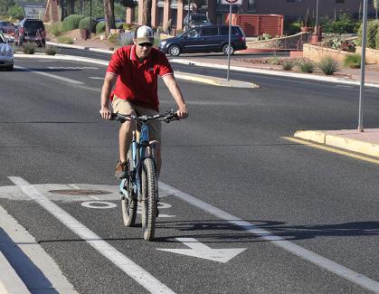 Luke Adams, of the Village of Oak Creek, often rides his bike to work, taking advantage of Sedona’s bike lane system. As a part of its general plan, Cottonwood plans on implementing a similar system.