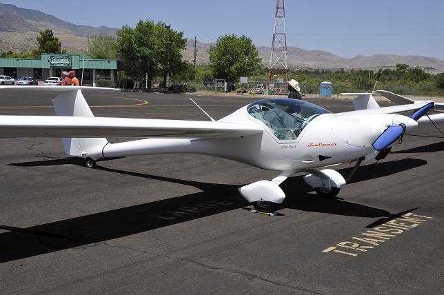 A motorized glider sits parked at the Cottonwood Airport on Thursday, June 12, the first day of the Touring Motor Glider Association fly-in. The crafts all can fly up to altitude on their own, rather than having to be towed, and then turn the motor off and glide.