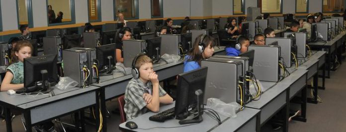 Mrs. McDowell’s fifth-grade class worked on their keyboard skills in the computer lab last spring. Now that school is out, the district has approved a $7 million budget for the coming school year, which covers everything from teacher’s wages to new computers.