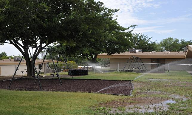 SprinklerS water the lawn at Clarkdale-Jerome School on in an attempt to keep it alive through the summer. Clarkdale is enacting Strategy II water restrictions, which will limit irrigation based on even or odd addresses and a corresponding day of the week.