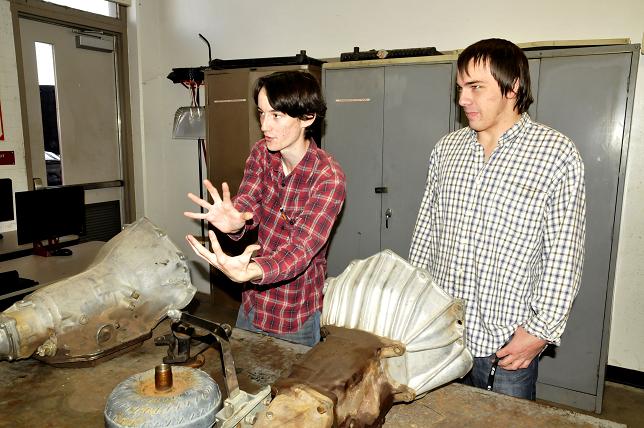 As many mechanics do, Baylen Mineer tends to talk with his hands when explaining things. With his partner Michael Fuller, right, the two took first place as a team in the Top Tech Challenge at Universal Technical Institute in Avondale.