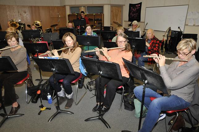 With the woodwinds in front and the brass toward the rear, the Cottonwood Community Band assembles for practice. The band, led by conductor Will Norris, practices every Monday from 7 to 9 p.m. in the Cottonwood Middle School band room.?