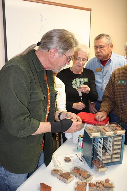 Newly retired archaeologist J. Scott Wood came to the Verde Valley Archaeology Center for a private lecture to members of the center. Wood was the lead archeologist for the Tonto National Forest, and brought with him samples of the pottery found there, made by the Hohokam.