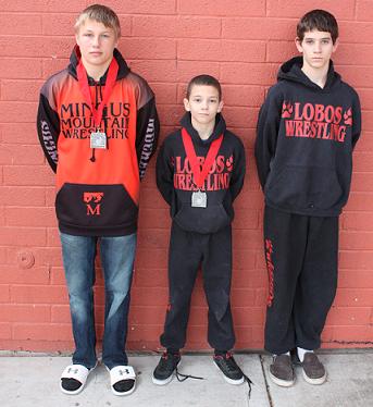 Eighth-grader Alex Nelson, left, and Cottonwood fifth-grader Elijah Miller, center, both made it to the championship matches in their weight classes at the Arizona State Middle School Championships in Tempe. Along with eighth-grader Trent Miller, right, they will be the Mingus Mountain Muckers’ prime contenders for AZUSA state championships Saturday, Feb. 21, at Casa Grande High School.