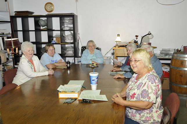 Camp Verde resident Cheri Wischmeyer, front, has started a petition to recall several members of the Town Council in response to them voting in favor of a tax increase. Last week, she held an informal meeting at the old Boler’s Bar to explain her position.