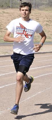 Michael Malloy runs his warm-up lap before practice starts. Part of the Camp Verde High School track team, his events are discus, 200- and 400-meter dashes, and the 4x400 relay.