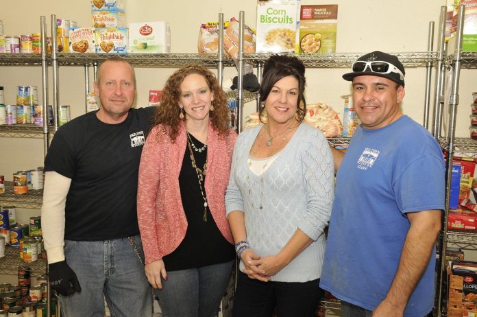 The Old Town Mission works to help alleviate hunger in the Verde Valley, serving as many as 100 meals per week. From left is Grocery Rescue Agent William Woodruff, General Manager Kellie Wilson, Assistant Manager Jill Sweet and Director of Maintenance Billy Rodriguez.