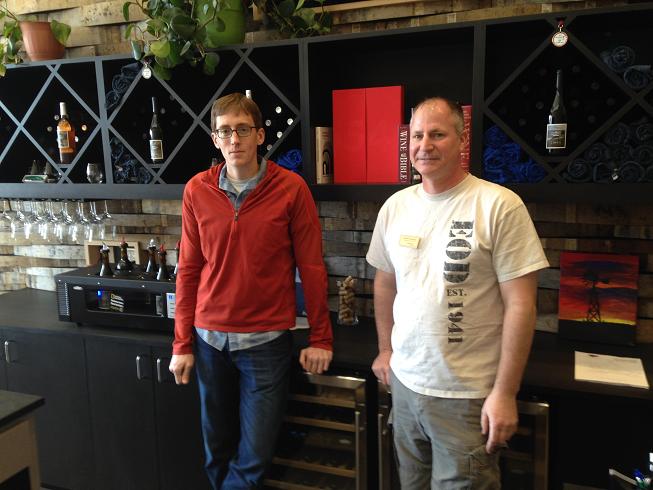 Michael Pierce, left, and Jason Nihart stand behind the bar of the recently opened Southwest Wine Center tasting room. Pierce is the center’s director of enology and Nihart is a full-time student in the Viticulture and Enology Associate of Applied Science degree program.