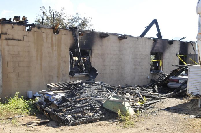 The house at 3055 Clinton Lane in Camp Verde caught fire the evening of Aug. 8. Originally a two-story building, the structure was completely involved in fire by the time first responders arrived. A body of a deceased male was found inside the building and transported to the Yavapai County Medical Examiner Office.