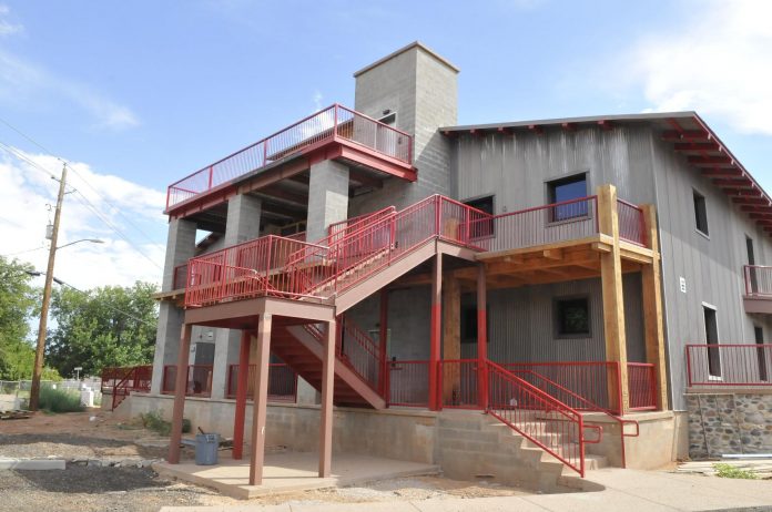 The backside of the new Camp Verde Community Library building has access to three levels. The ground floor entrance goes to a conference room that can be used after normal library hours for meetings. The second floor features a balcony that mirrors the building’s front, and the top level will be used for astronomy workshops.