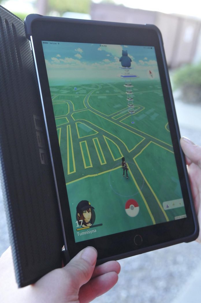 PokÉmon are caught in Pokémon Go by roaming the area to find the creatures. Before Pokémon Go was around, geocaching was done in much the same way by the town.