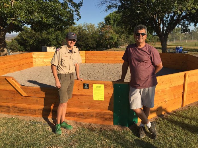 Dallin Gordon and Paul Grasso stand before a recently completed gaga pit at Clarkdale-Jerome School. Gordon worked on the project for his Boy Scouts of America Eagle Scout rank, and Grasso mentored him.