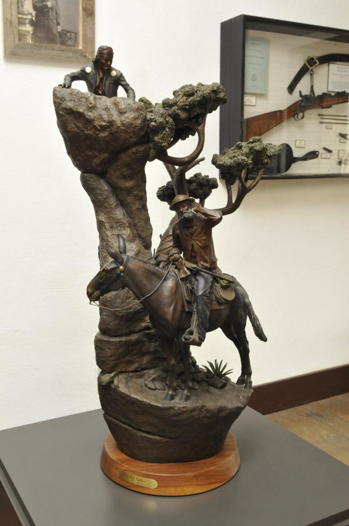 A bronze sculpture titled Gray Wolf Vigilance by Clyde Ross Morgan was recently donated to Fort Verde State Historic Park. The bronze features Gen. George Crook on his mule Apache, in search of Geronimo, who watches from above. The statue was previously owned by the late Thron Riggs, a former mayor of Sedona, and his wife Iva.