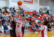 Marauders girls basketball wins first home game