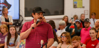 Dozens defend A Troupe Of Ridiculous Thespians teacher at school board meeting