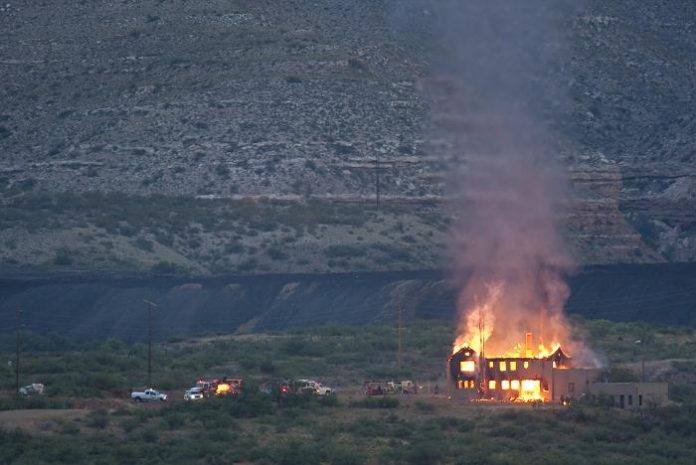 Flames engulf historic Clark Mansion, which caught fire sometime before 4:30 a.m. Friday, Jan. 25. Cottonwood Fire Department and the Sedona, Camp Verde, Clarkdale and Verde Valley fire districts all responded to battle the blaze, according to Clarkdale Fire Chief Joe Moore. The building, which is listed on the National Register of Historic Places, is a total loss, Moore said.