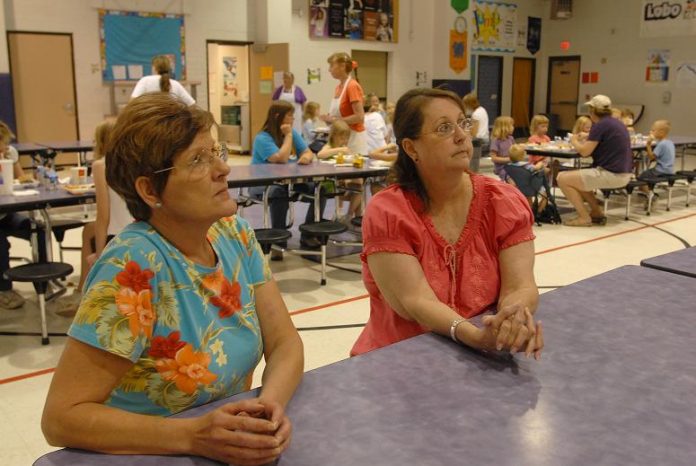 Cottonwood-Oak Creek School District Food Service Secretary B.J. Lyttle, right, and Food Service Manager Laura Engebretson talk about concerns they have regarding the Mingus Union High School District’s decision to outsource their school’s food services Thursday, June 3.