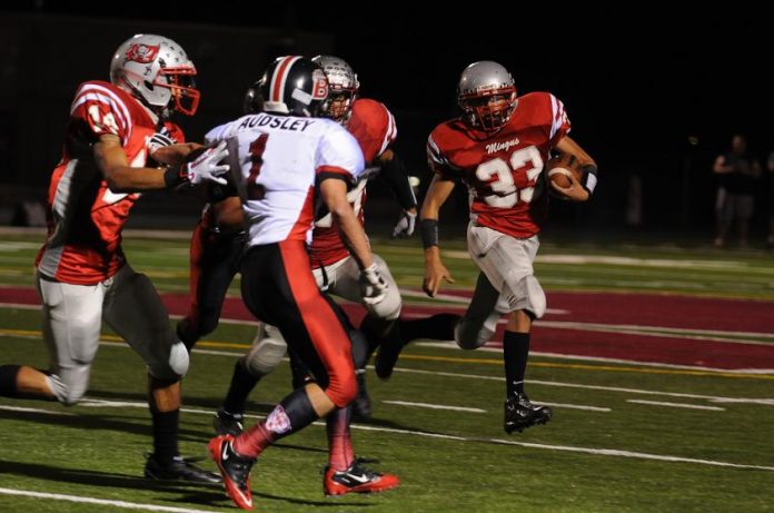 junior carlos abrigo looks to find a seam against Bradshaw Mountain High School on Friday, Sept. 17. The Marauders played good defense and had just enough offense to get a 12-7 victory.